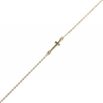 Minimalistyczny złoty łańcuszek z subtelnym krzyżykiem